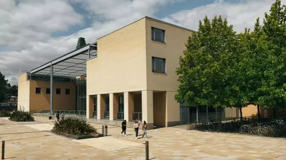 The Said Business School, Park End Street, with students walking past.