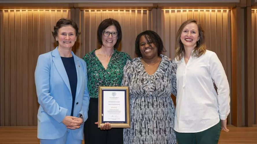 The VC (left) presents the Empowering People Award to Clare Oxenbury-Palmer (Law), Elisha Ward (SSD), and Anne Wolfes (Psychiatry)