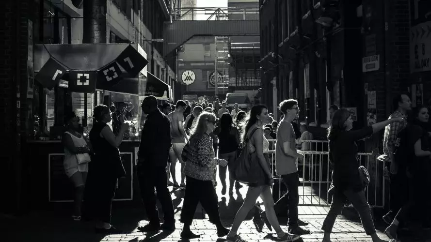 A busy street full of people