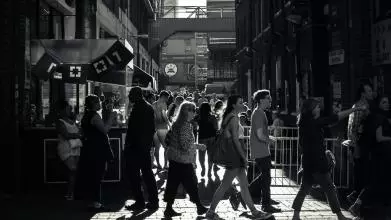 A busy street full of people