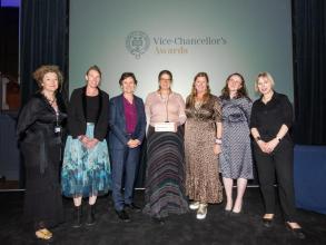 Winners of the Making a Difference Globally Award 2025 - The Maasai Living Cultures Project - stand on stage with the VC